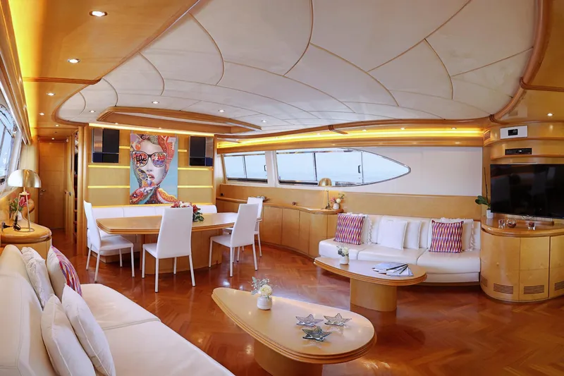 Lady A Yacht Photos Pics Luxurious interior of 2000 Maiora 29 DP yacht with modern decor and elegant furnishings.