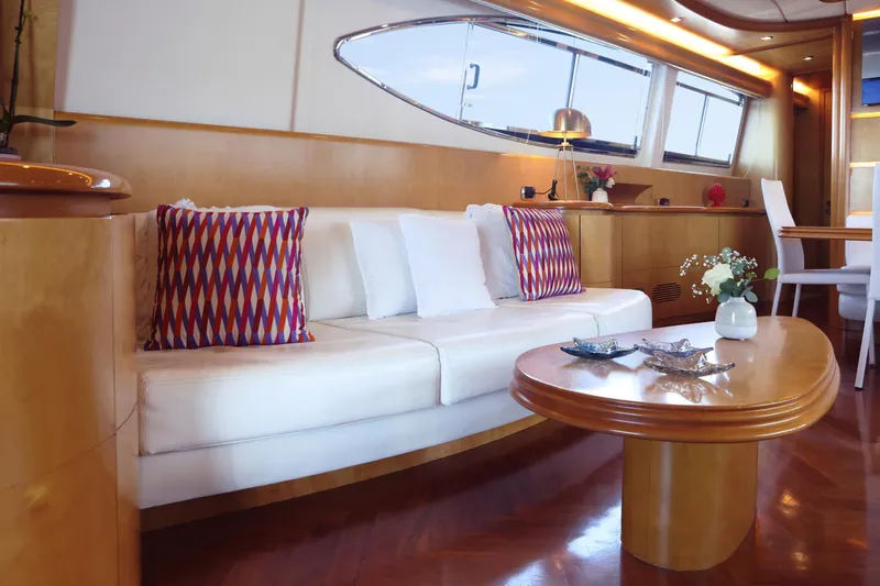 Lady A Yacht Photos Pics Luxurious interior of 2000 Maiora 29 DP yacht with elegant seating and decor.