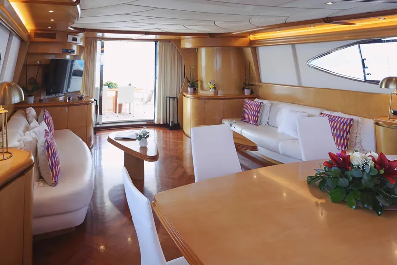 Lady A Yacht Photos Pics Luxurious interior of 2000 Maiora 29 DP yacht with elegant seating and decor.