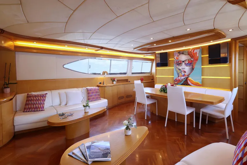 Lady A Yacht Photos Pics Luxurious Maiora 29 DP yacht interior, featuring elegant seating, modern art, and stylish decor.