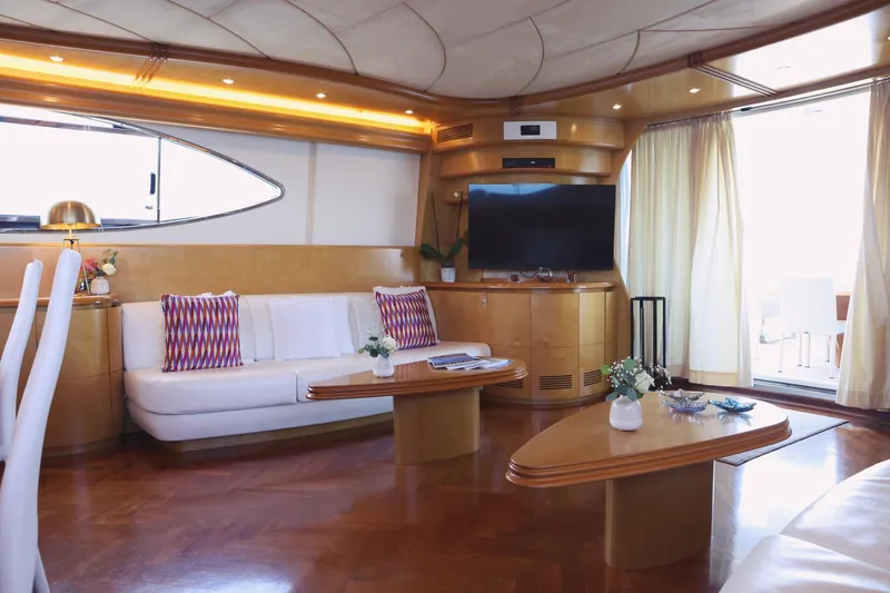 Lady A Yacht Photos Pics Luxurious interior of 2000 Maiora 29 DP yacht with elegant furnishings and modern decor.