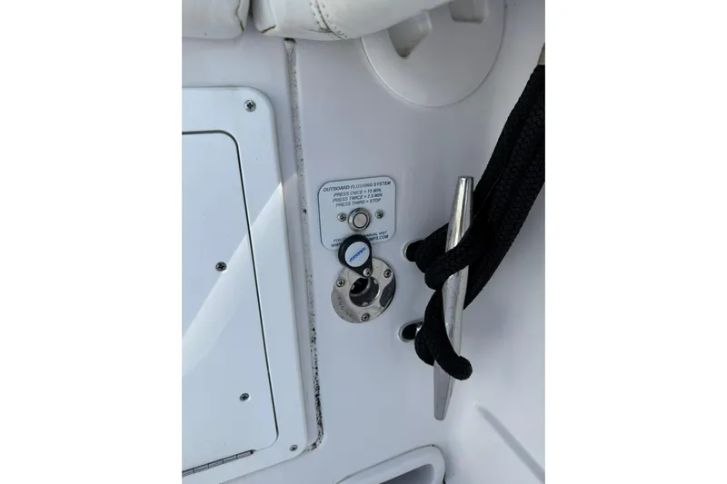  Yacht Photos Pics 2021 Jupiter 38 HFS boat detail with outboard flushing system and cleat.