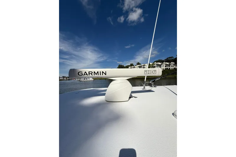  Yacht Photos Pics Garmin xHD2 radar on 2021 Jupiter 38 HFS boat under clear blue sky.