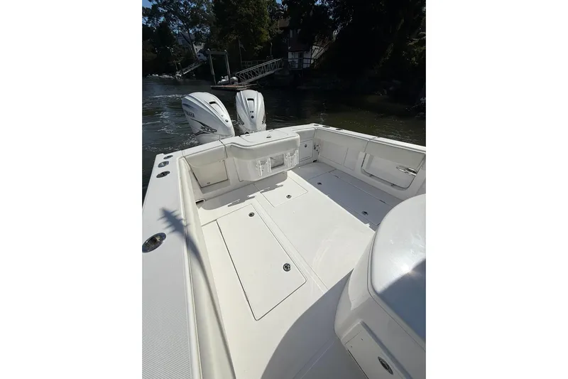  Yacht Photos Pics 2021 Jupiter 38 HFS boat with dual outboard engines, spacious deck, and sleek design.
