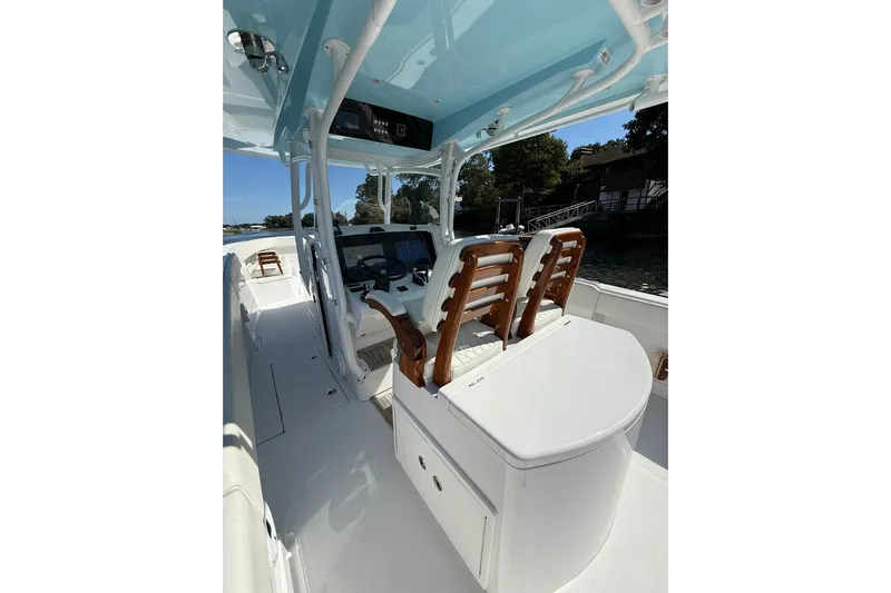  Yacht Photos Pics 2021 Jupiter 38 HFS boat interior with helm, seating, and sleek design.