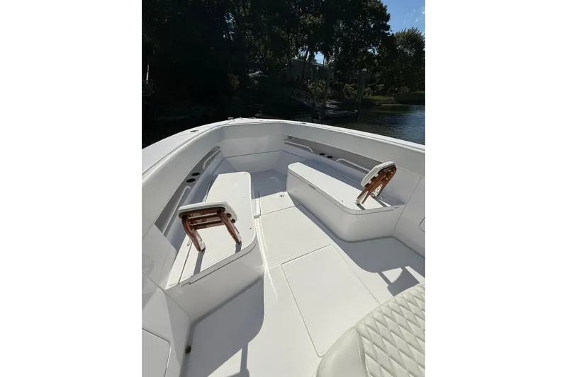  Yacht Photos Pics 2021 Jupiter 38 HFS boat interior with white seating and wooden accents.