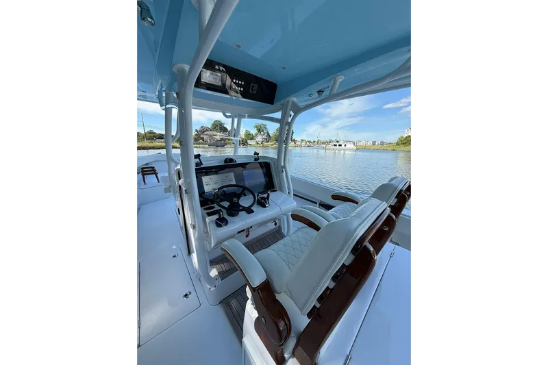  Yacht Photos Pics Interior view of 2021 Jupiter 38 HFS boat with modern helm and seating.