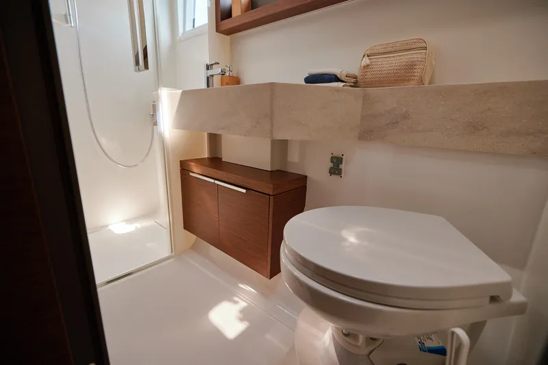 Spellbound Yacht Photos Pics Modern bathroom in 2023 Lagoon 50 yacht with shower and toilet.