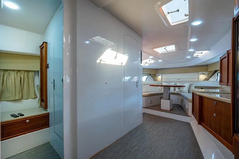 Annie Yacht Photos Pics Interior of 2014 Intrepid 475 Sport Yacht, featuring modern design and luxurious seating area.
