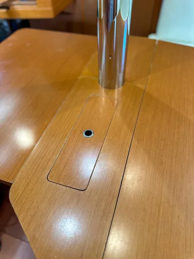 Sadalbari Yacht Photos Pics Wooden table with metal pole on Beneteau Oceanis 41.1, 2018 model.