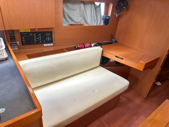 Sadalbari Yacht Photos Pics Interior of 2018 Beneteau Oceanis 41.1 yacht with seating and navigation station.