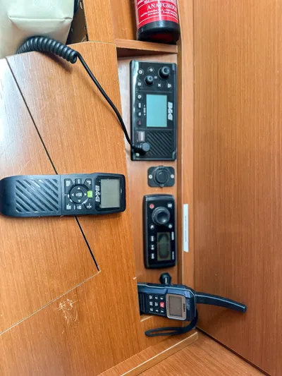 Sadalbari Yacht Photos Pics Control panel of a 2018 Beneteau Oceanis 41.1 sailboat with communication devices.