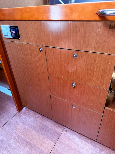 Sadalbari Yacht Photos Pics Wooden cabinetry in a 2018 Beneteau Oceanis 41.1 yacht interior.