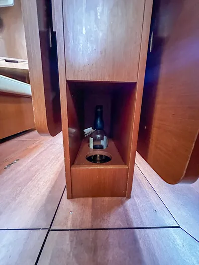 Sadalbari Yacht Photos Pics Wooden interior of 2018 Beneteau Oceanis 41.1 yacht with built-in bottle holder.