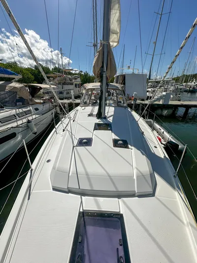 Sadalbari Yacht Photos Pics 2018 Beneteau Oceanis 41.1 sailboat docked at marina under clear blue sky.