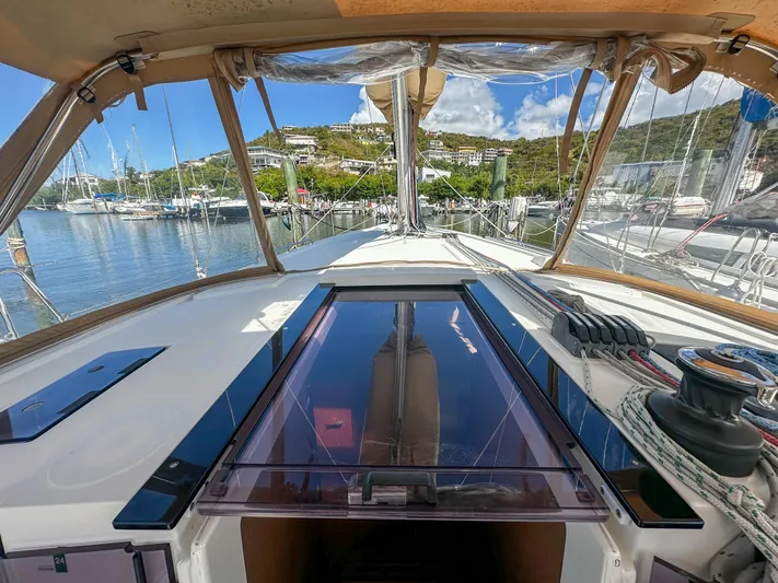 Sadalbari Yacht Photos Pics Cockpit view of 2018 Beneteau Oceanis 41.1 sailboat docked in a scenic marina.