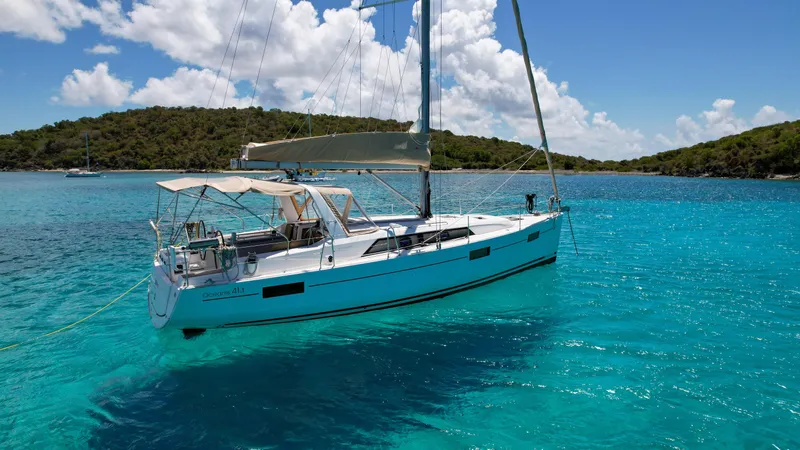 Sadalbari Yacht Photos Pics 2018 Beneteau Oceanis 41.1 sailboat anchored in clear turquoise waters.