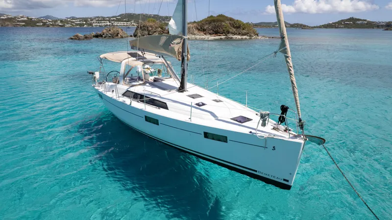 Sadalbari Yacht Photos Pics 2018 Beneteau Oceanis 41.1 sailboat anchored in clear turquoise waters.