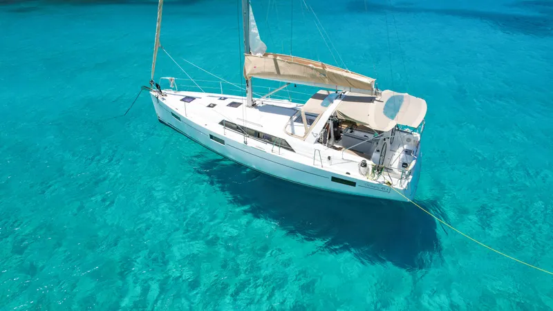Sadalbari Yacht Photos Pics 2018 Beneteau Oceanis 41.1 sailboat on clear turquoise water.