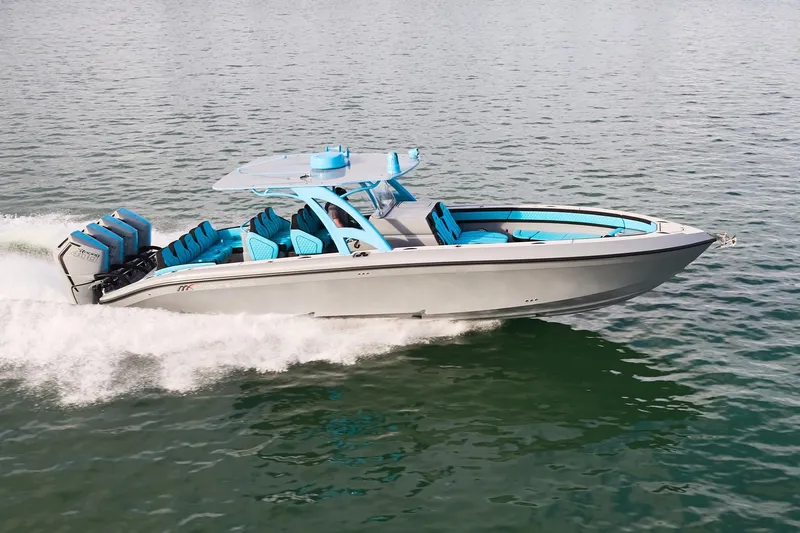  Yacht Photos Pics 2024 Midnight Express 37' Open boat cruising on water, featuring sleek design and powerful engines.