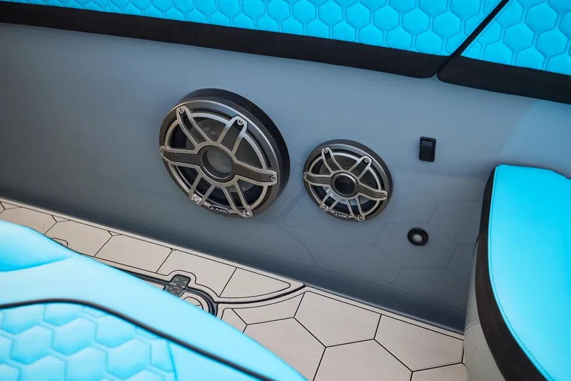  Yacht Photos Pics 2024 Midnight Express 37' Open boat interior with blue seating and built-in speakers.