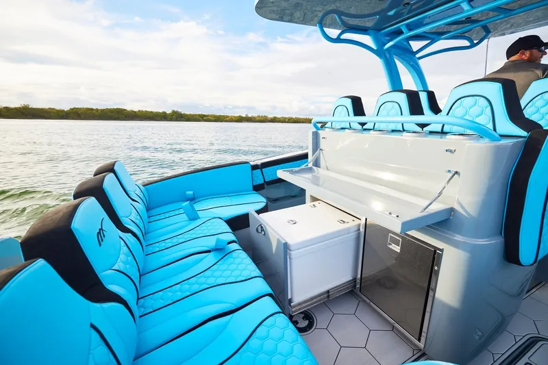  Yacht Photos Pics 2024 Midnight Express 37' Open boat with luxurious blue seating and modern amenities.