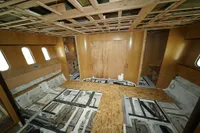 Interior of a 2025 Custom HARD TOP 78 yacht under construction, featuring wooden framework.