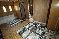 Interior of a 2025 Custom HARD TOP 78 yacht under construction, showing exposed framework.