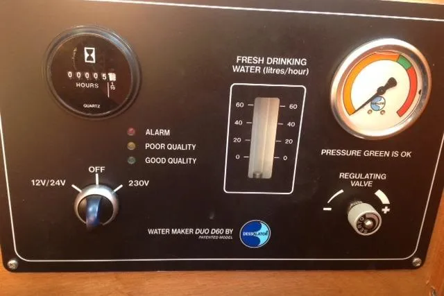 Boxter Yacht Photos Pics Control panel of a 2013 Beneteau Sense 50 water maker, showing gauges and settings.