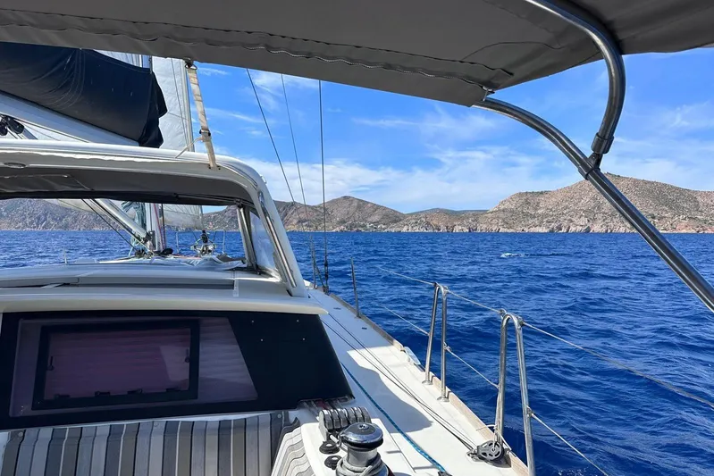 Boxter Yacht Photos Pics Sailing on a 2013 Beneteau Sense 50 yacht with scenic ocean and mountain views.
