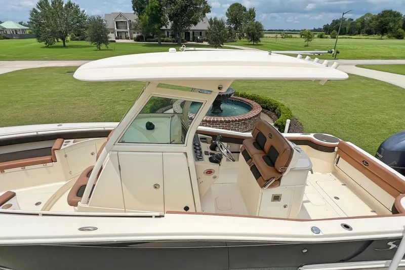  Yacht Photos Pics 2014 Scout 275 LXF boat with sleek design and spacious seating.