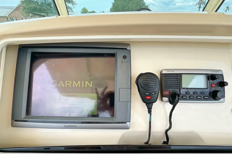  Yacht Photos Pics Garmin navigation system and radio on 2014 Scout 275 LXF boat dashboard.