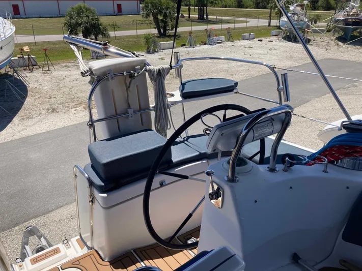 Fela Yacht Photos Pics 2009 Hunter 49 Aft Cockpit sailboat helm with seating and steering wheel.