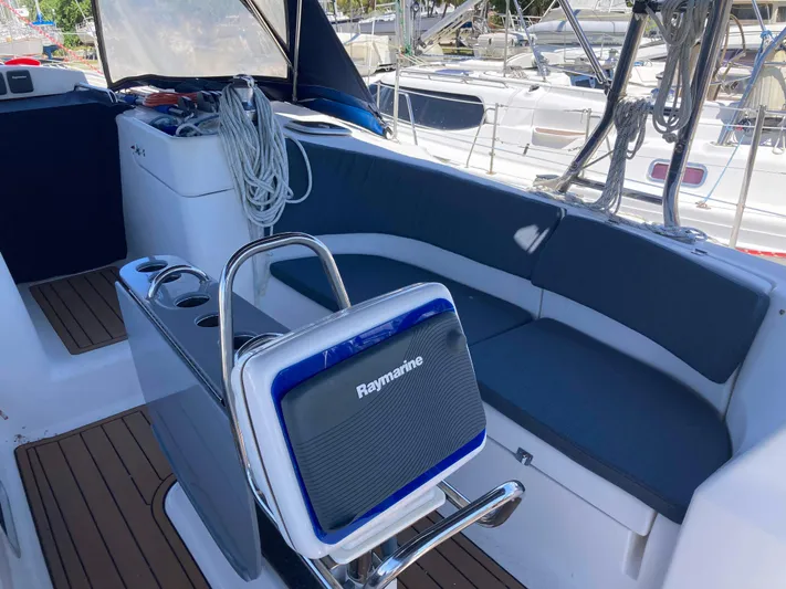Fela Yacht Photos Pics 2009 Hunter 49 Aft Cockpit with Raymarine equipment and seating area.