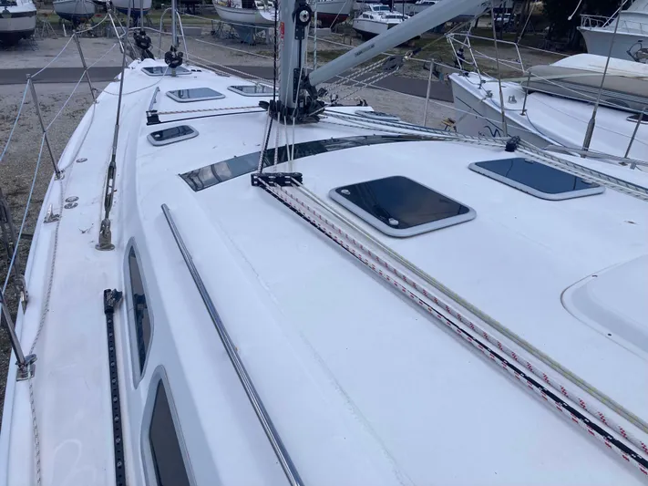 Fela Yacht Photos Pics 2009 Hunter 49 Aft Cockpit sailboat deck with hatches and rigging.