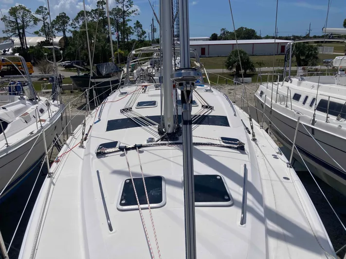 Fela Yacht Photos Pics 2009 Hunter 49 Aft Cockpit sailboat docked, showcasing deck and rigging details.