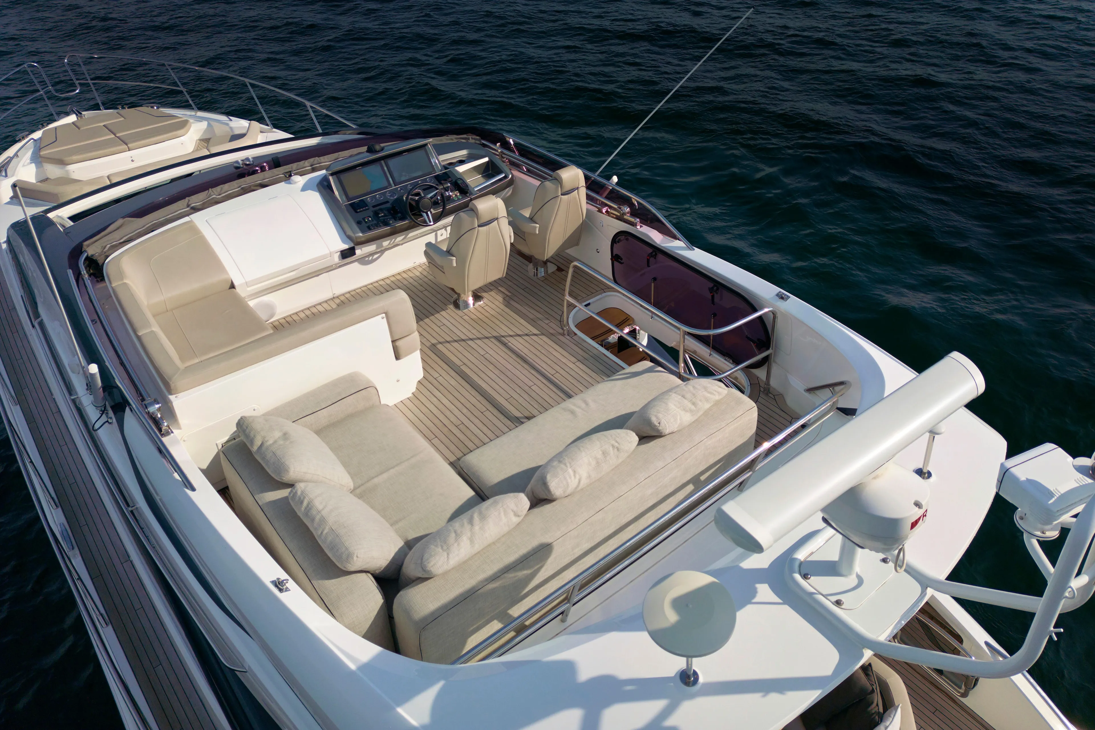  Yacht Photos Pics Luxury Princess S66 yacht deck, 2021 model, with elegant seating and ocean view.