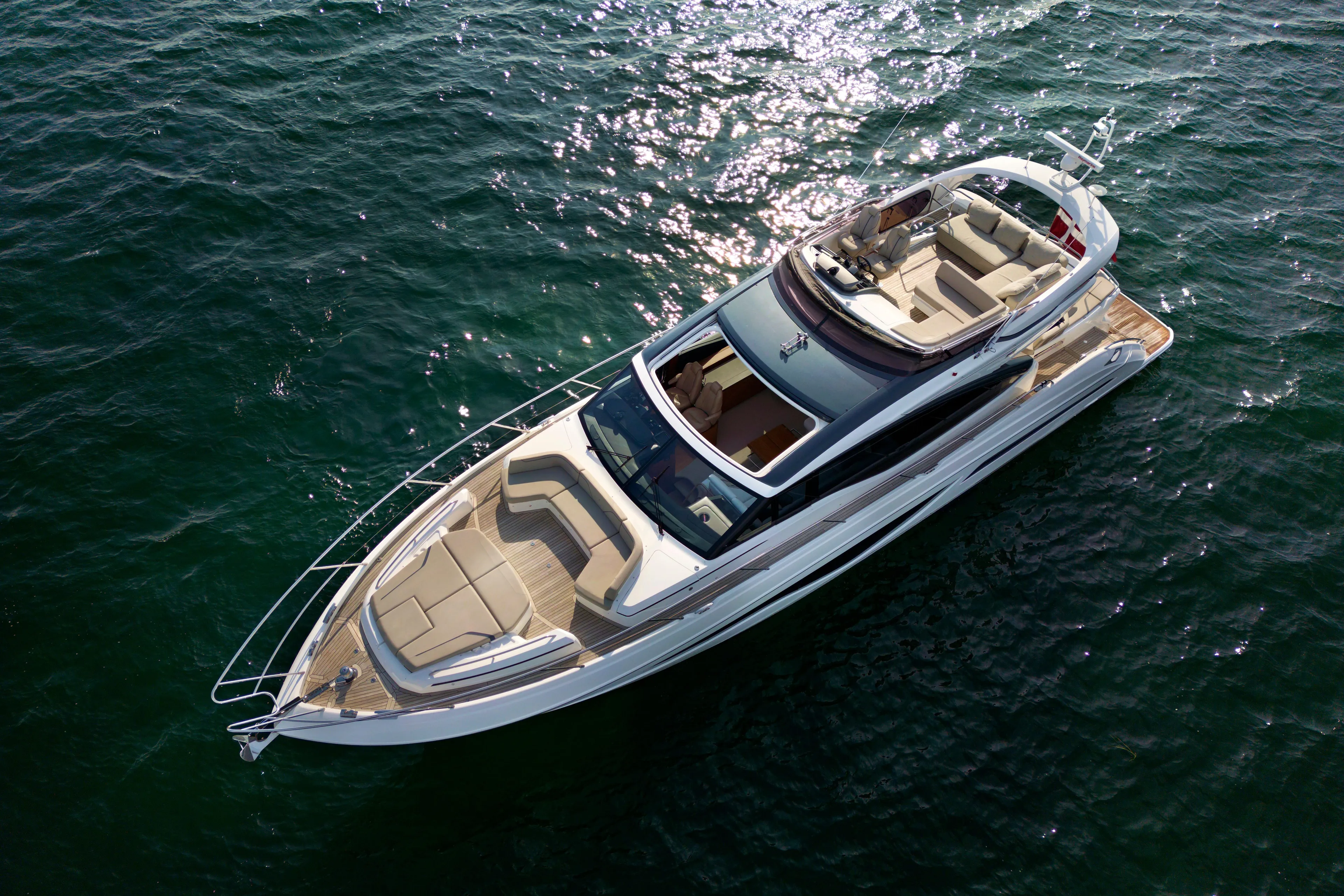  Yacht Photos Pics Luxury Princess S66 yacht cruising on open water, 2021 model.