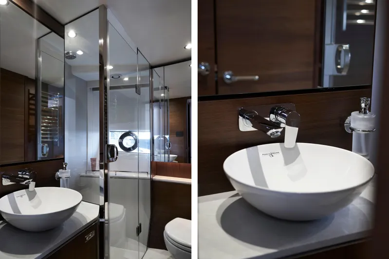  Yacht Photos Pics Luxurious bathroom in 2021 Princess S66 yacht with modern fixtures and elegant design.