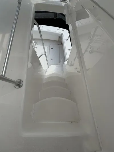 Rabbit Hole Yacht Photos Pics Stairway on 2005 Luhrs 41 Convertible yacht, leading to lower deck area.