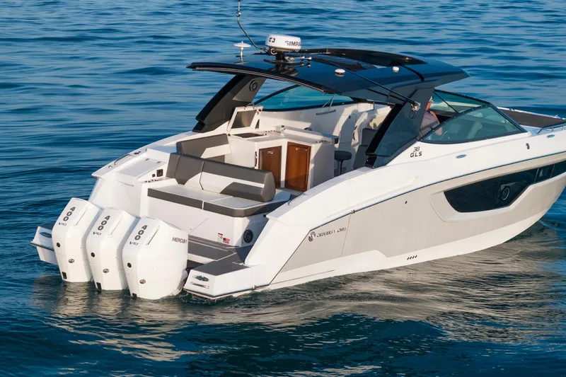  Yacht Photos Pics 2026 Cruisers Yachts 38 GLS OB luxury boat on calm water.