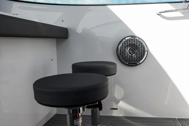  Yacht Photos Pics 2026 Cruisers Yachts 38 GLS OB interior with bar stools and speaker.