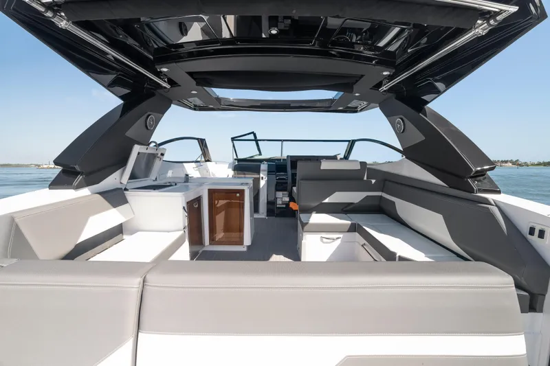  Yacht Photos Pics 2026 Cruisers Yachts 38 GLS OB interior with sleek seating and modern design.