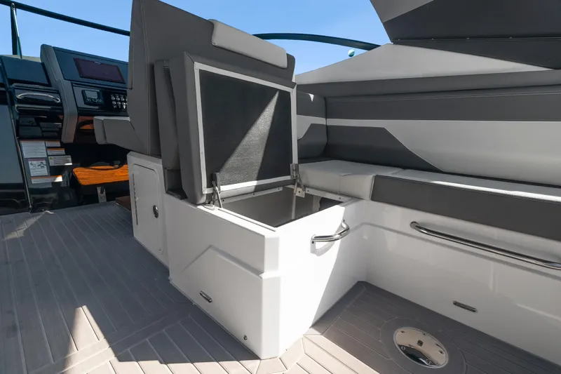  Yacht Photos Pics 2026 Cruisers Yachts 38 GLS OB interior with open storage compartment and sleek seating.
