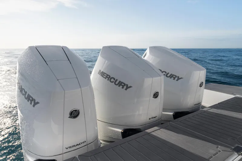  Yacht Photos Pics 2026 Cruisers Yachts 38 GLS OB with triple Mercury Verado outboard engines on open water.