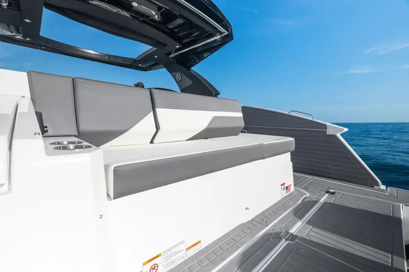  Yacht Photos Pics 2026 Cruisers Yachts 38 GLS OB boat interior with seating, ocean view, and sleek design.