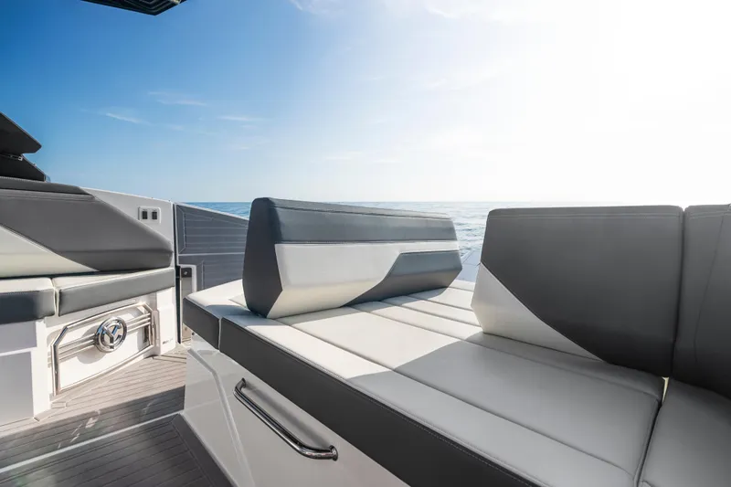  Yacht Photos Pics 2026 Cruisers Yachts 38 GLS OB interior with sleek seating and ocean view.