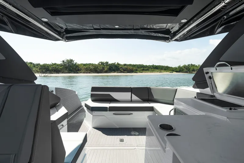  Yacht Photos Pics Luxurious 2026 Cruisers Yachts 38 GLS OB interior with scenic water view.