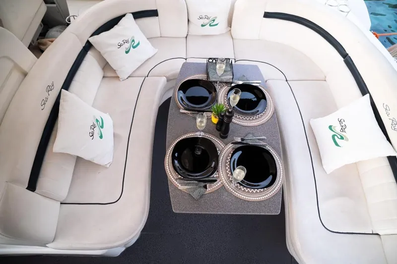  Yacht Photos Pics Luxurious 2005 Searay Sundancer 390 yacht interior with elegant dining setup.