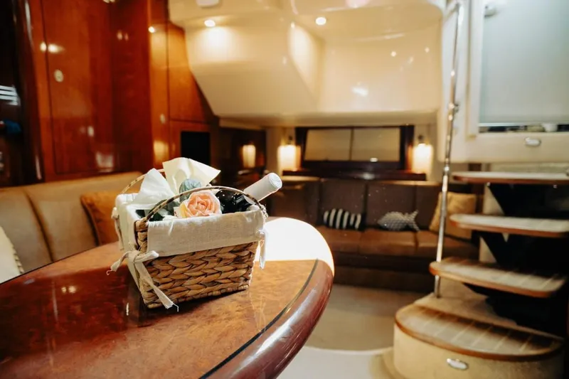  Yacht Photos Pics Luxurious interior of 2005 Searay Sundancer 390 yacht with elegant decor and cozy seating.